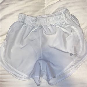 white nike shorts